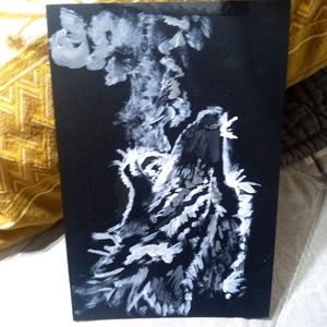 My art "wolf howl" white acrylic on black cowhide. 5 3/4" x 3 3/4"